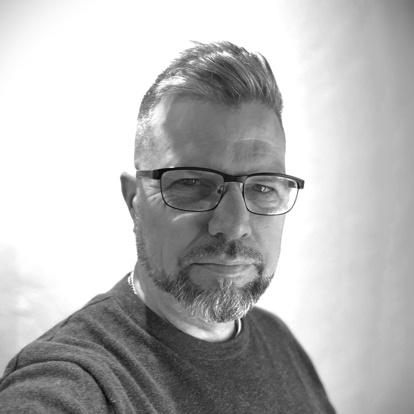 B&W photo of Jordan C. Mann